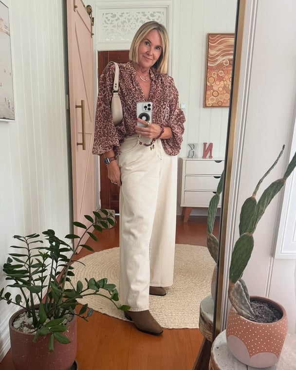 Content creator and designer Nikki Parsons shows how to contrast a boho blouse with casual, utility-style pieces