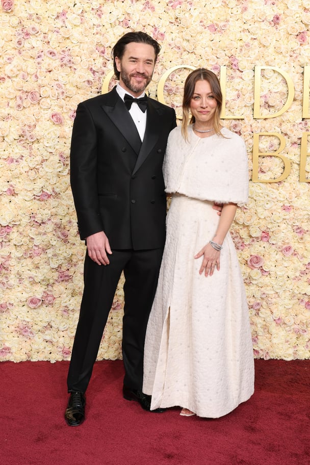 Tom Pelphrey and Kaley Cuoco attend the 82nd Annual Golden Globe Awards.