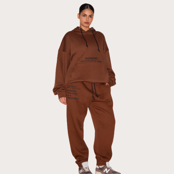 woman wearing hoodie and trackpants in brown from Pretty Little Thing