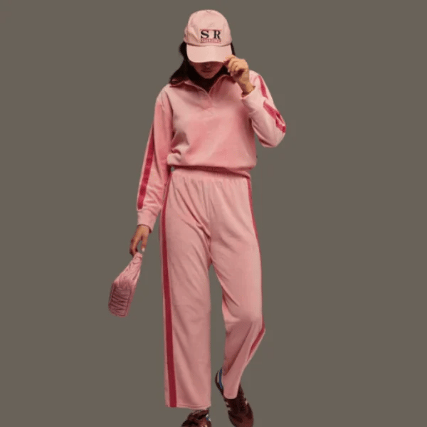 woman wearing sweater and pants in pink from Araminta James