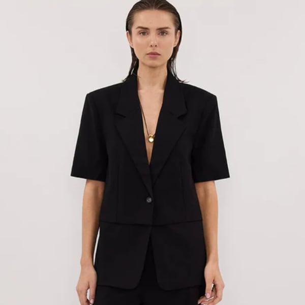 Structured shoulders into a relaxed silhouette blazer from Dissh