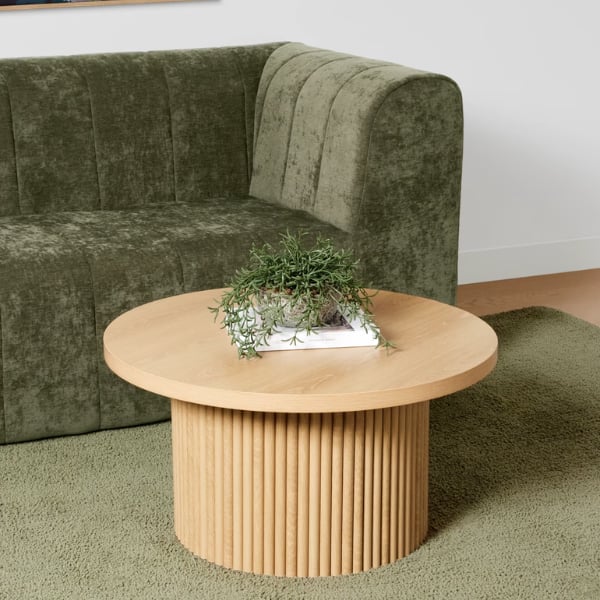 Oak coffee table designed with a ribbed profile.