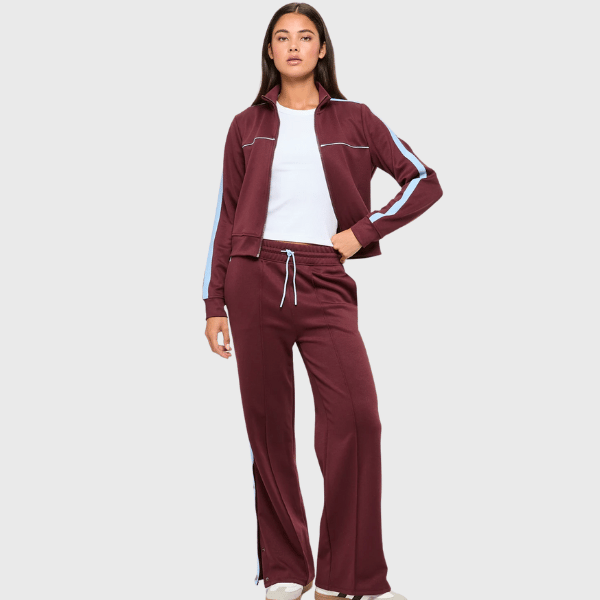 woman wearing jacket and trackpants in red from Target