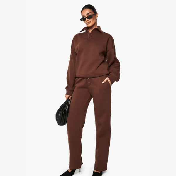 woman wearing sweatshirt and straight leg jogger from boohoo