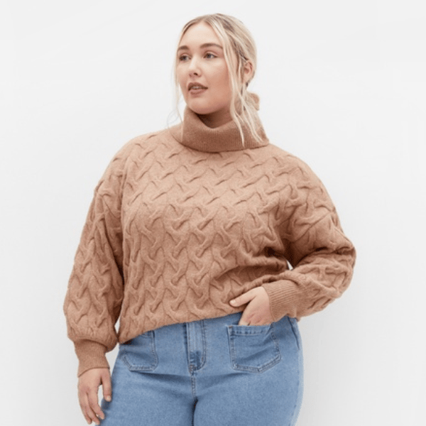 woman wearing chunky roll neck knit jumper from city chic