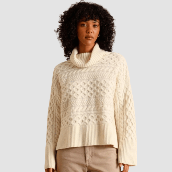 woman wearing cream knit jumper from Piper