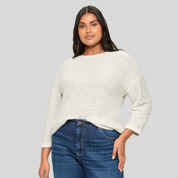 woman wearing off white knit top from Target