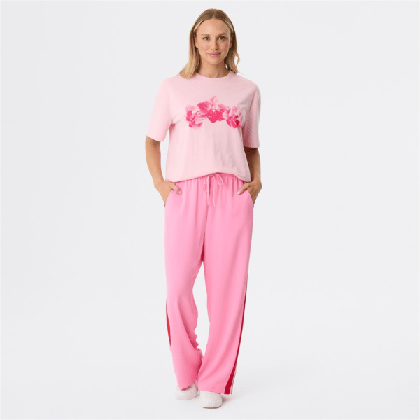 stretch fit pants in pink with red stripes from &me