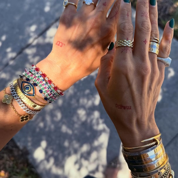Jewellery influencer GiOnna DiSalvatore wears her iconic wrist stacks.