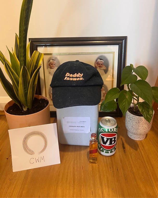 Plants and ashes with a cap on it.