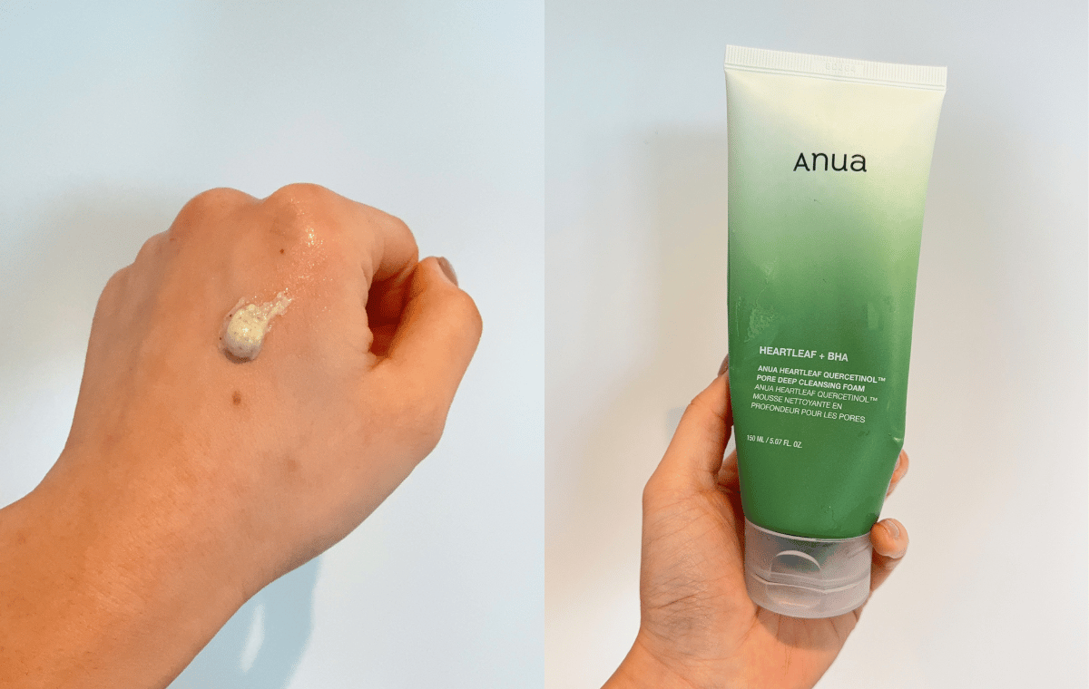 The Anua Heartleaf Quercetinol Pore Deep Cleansing Foam formulation on a woman's hand.