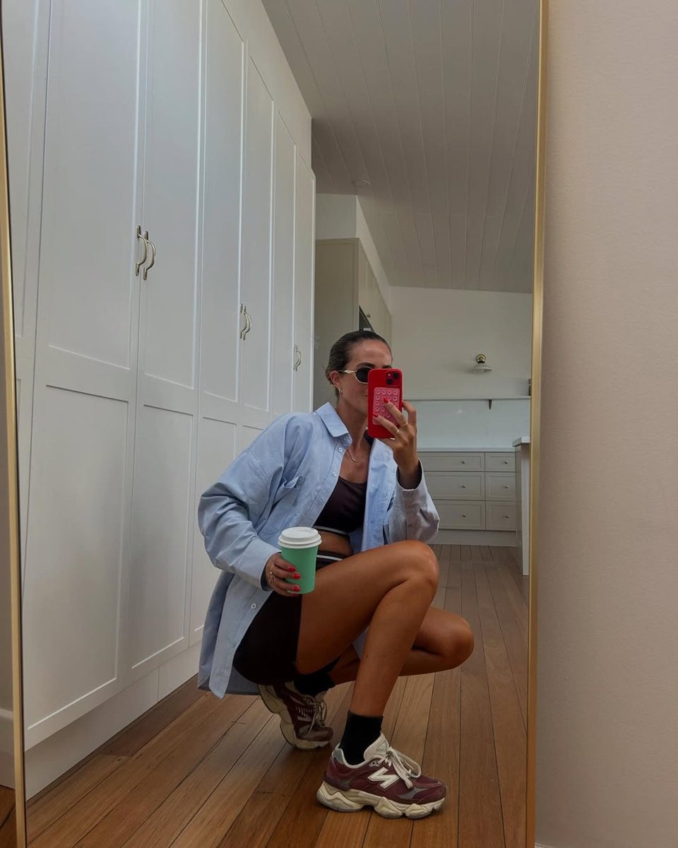 Influencer In By Hannah wears the viral Kmart Oxford shirt