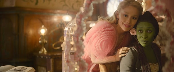 Ariana Grande as Galinda and Cynthia Erivo as Elphaba in the movie Wicked.