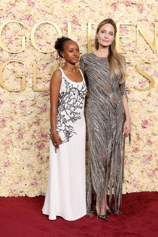 Zahara Jolie and Angelina Jolie attend the 82nd Annual Golden Globe Awards.