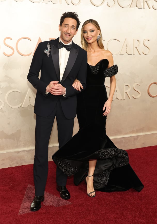 Adrien Brody and Georgina Chapman attend the 97th Annual Oscars at Dolby Theatre on March 02, 2025 in Hollywood, California.