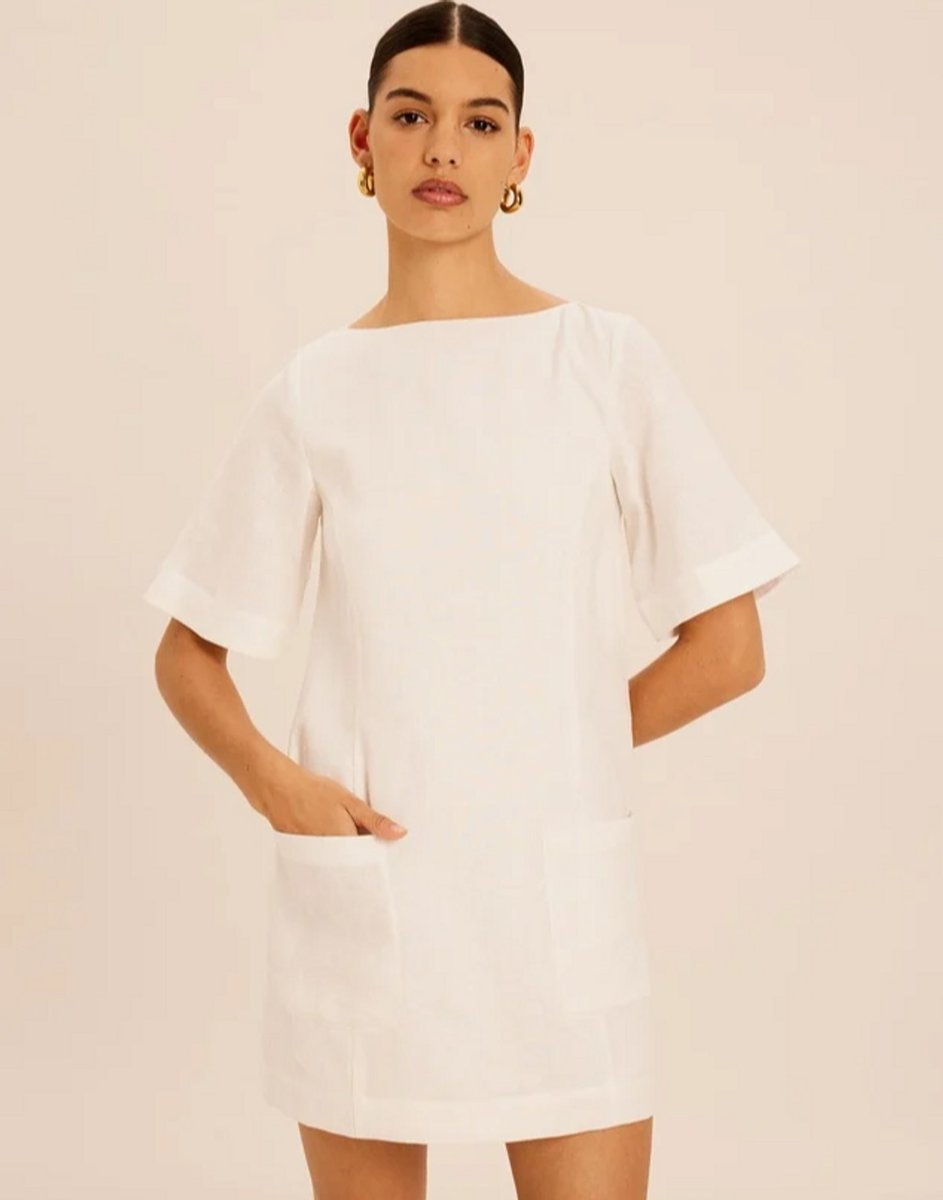 woman wearing linen ava dress