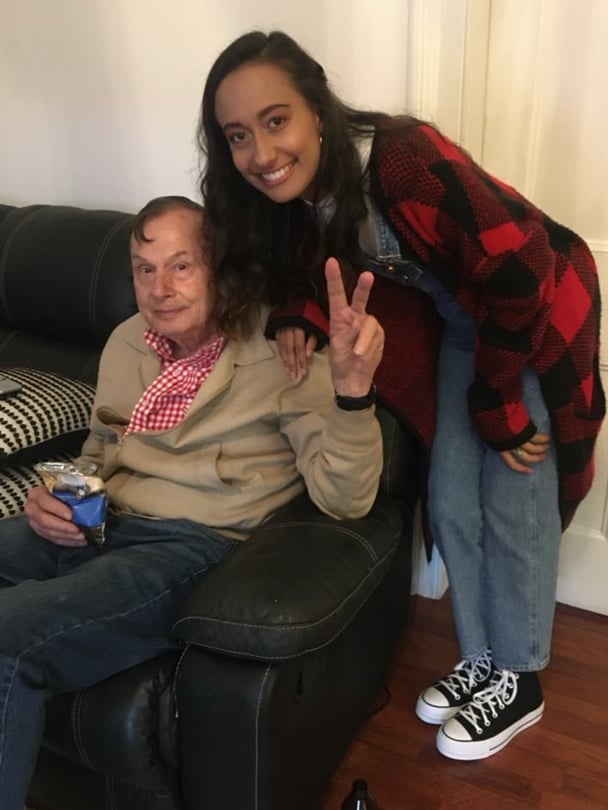 Alisa and her dad smiling.