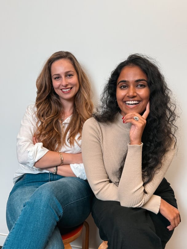 Anastasia Hronis and Ashani Dante, the hosts of Mamamia's But Are You Happy? podcast.