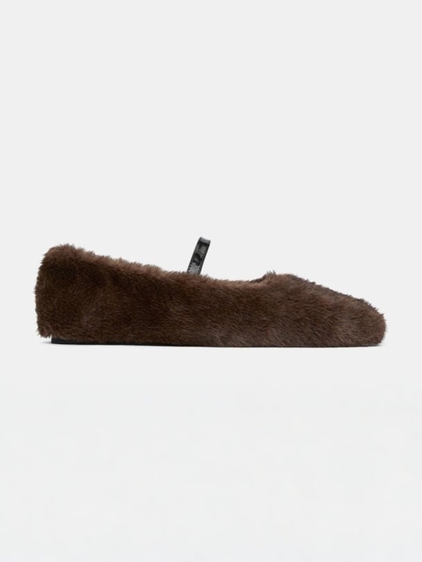Brown fluffy mary janes.