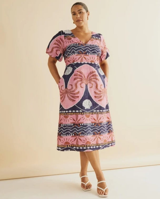 woman wearing atmos&here dress