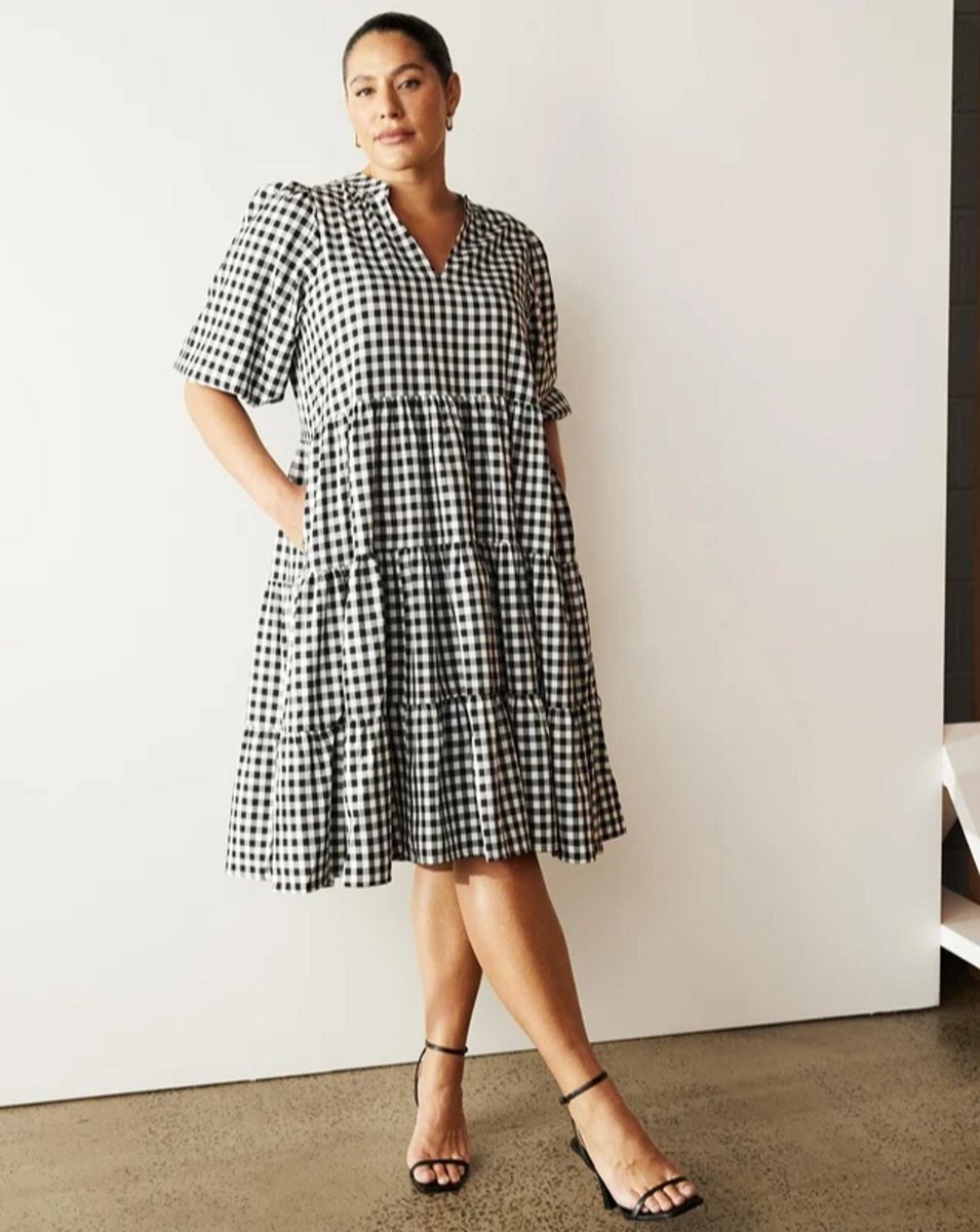 woman wearing gingham dress