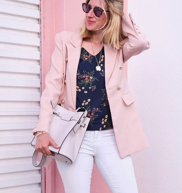 woman wearing blush blazer