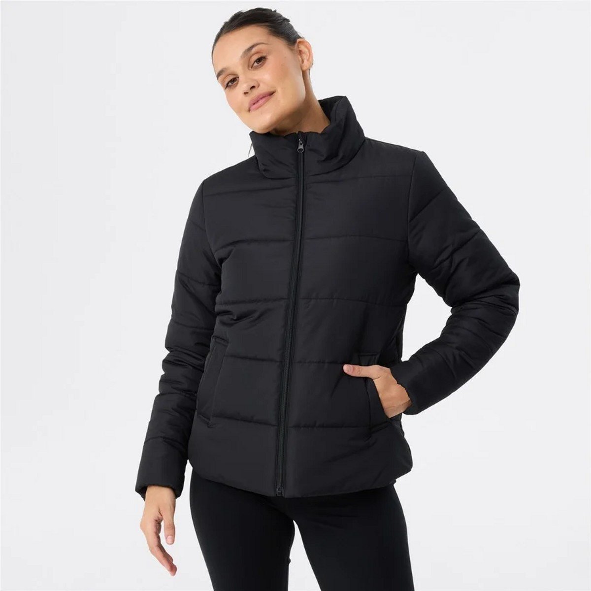 woman wearing a black puffer jacket from Big W 