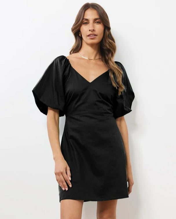 woman wearing black mini dress