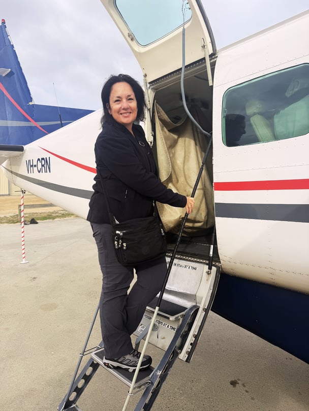 Leonie feigning confidence boarding the light plane to Flinders Island, Tasmania.