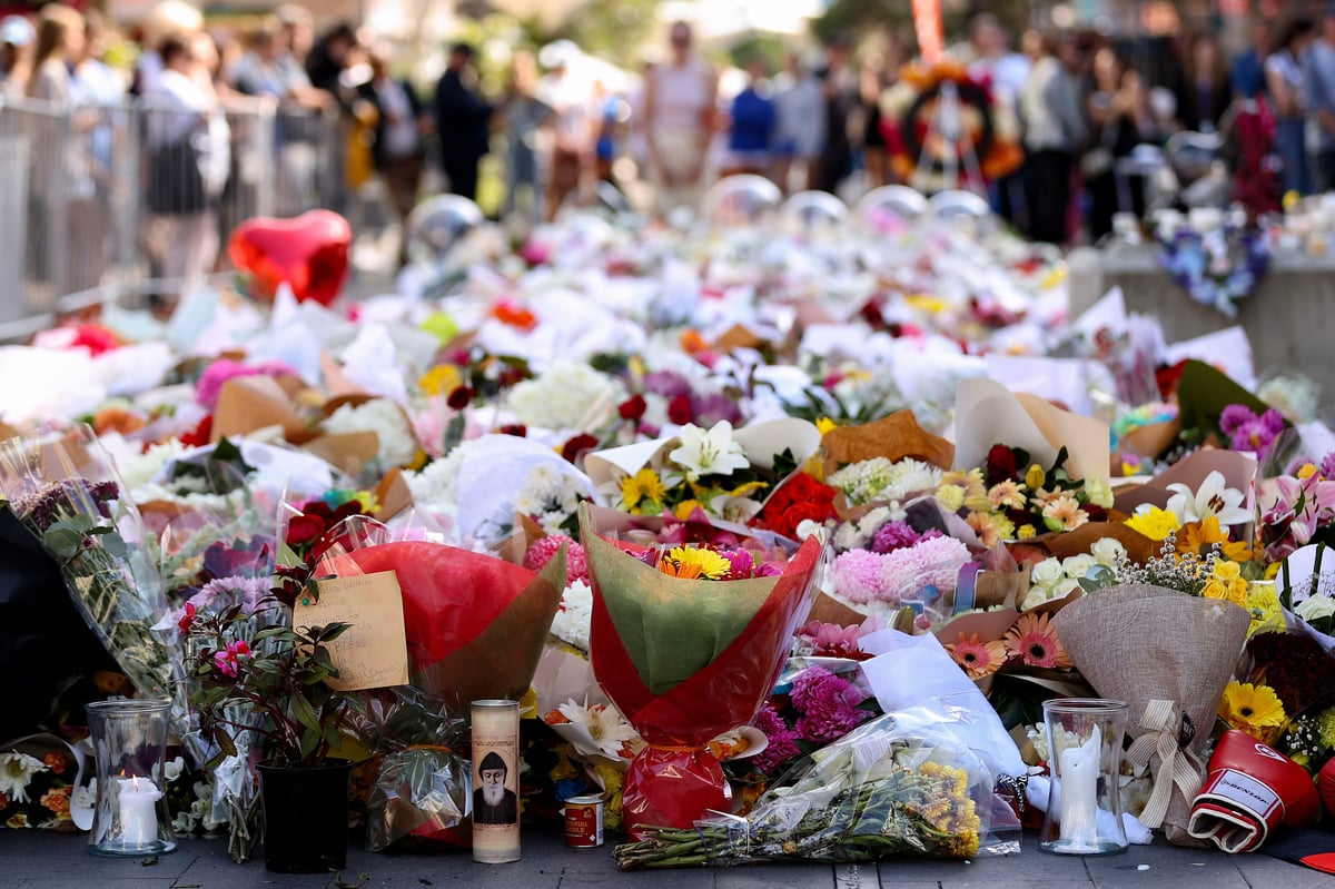 Community members left tributes at a memorial for those killed in the Westfield Bondi Junction stabbing massacre.