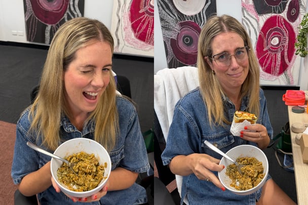 woman holding a bowl of boy kibble