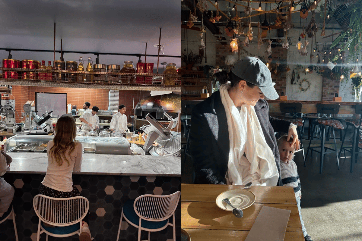 Children sitting at a restaurant bar while chefs cook behind on the left, a mum and her son at a breakfast cafe, dressed for winter.