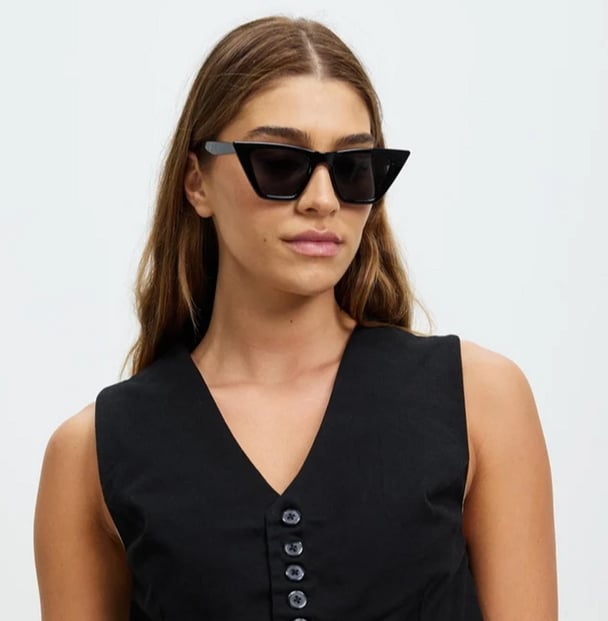 woman wearing black cancer council sunglasses