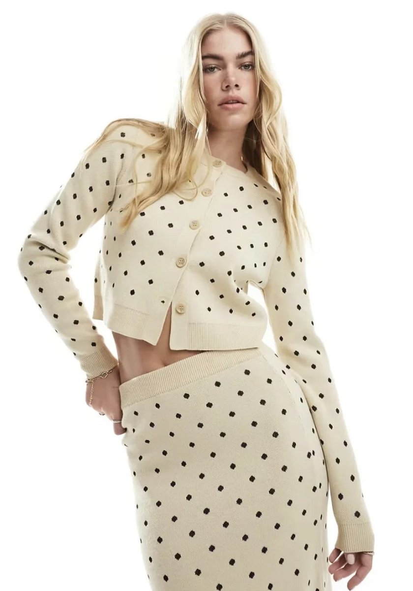 woman wearing poloka dot cardigan