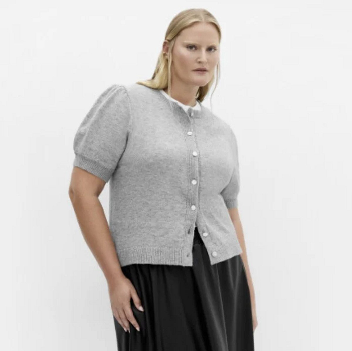 woman wearing grey cardigan 