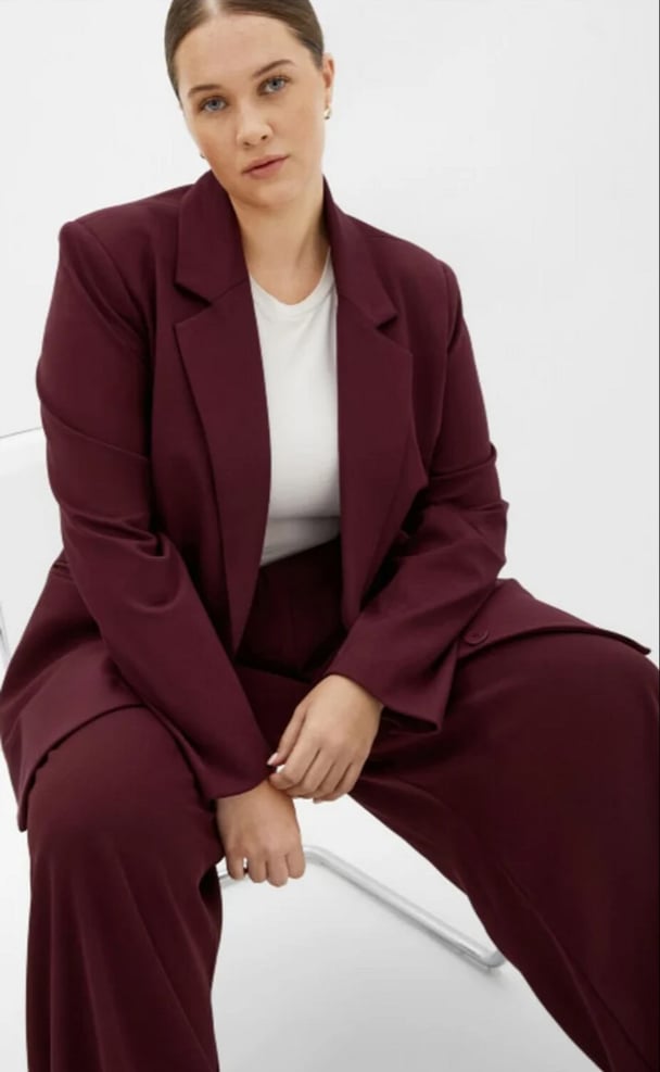 woman wearing cherry red blazer