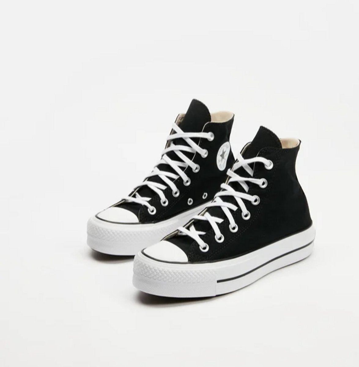 chuck taylors with a platform black and white