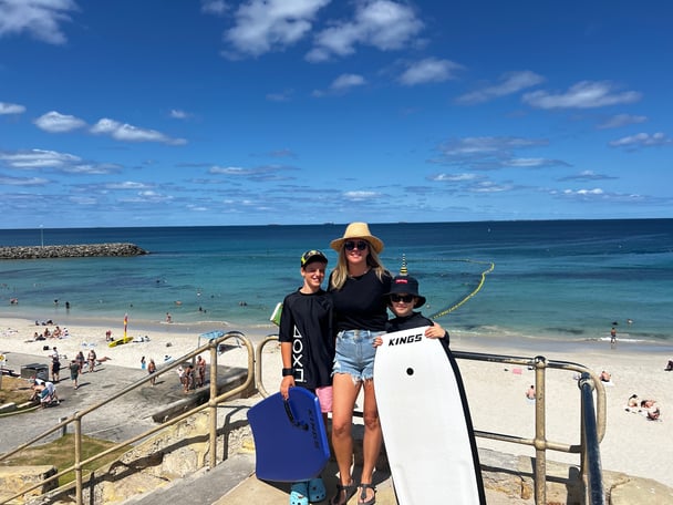woman and two boys at Cottesloe Beach 