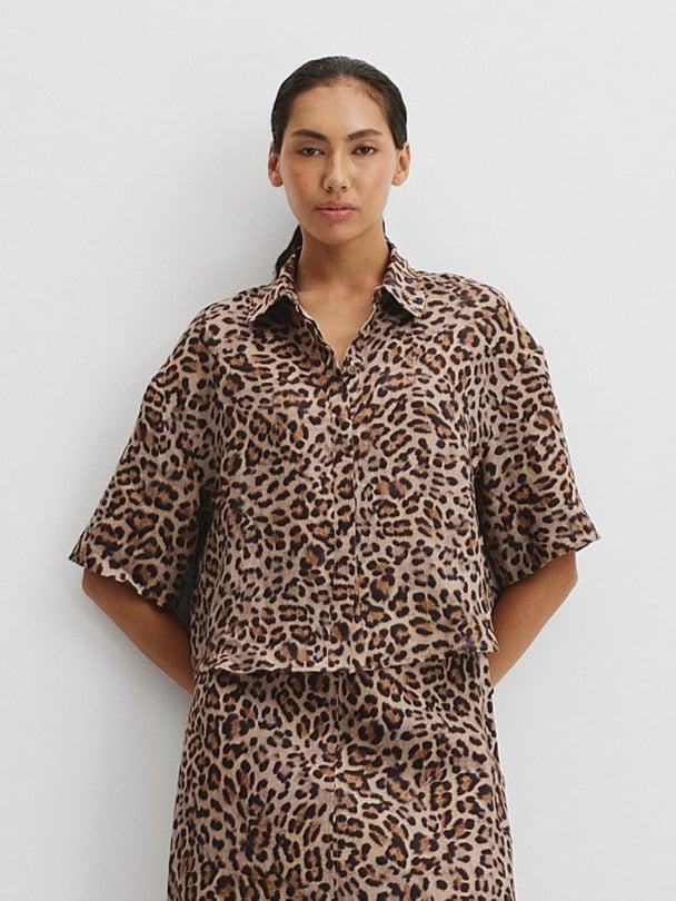 Leopard print short sleeve shirt. 