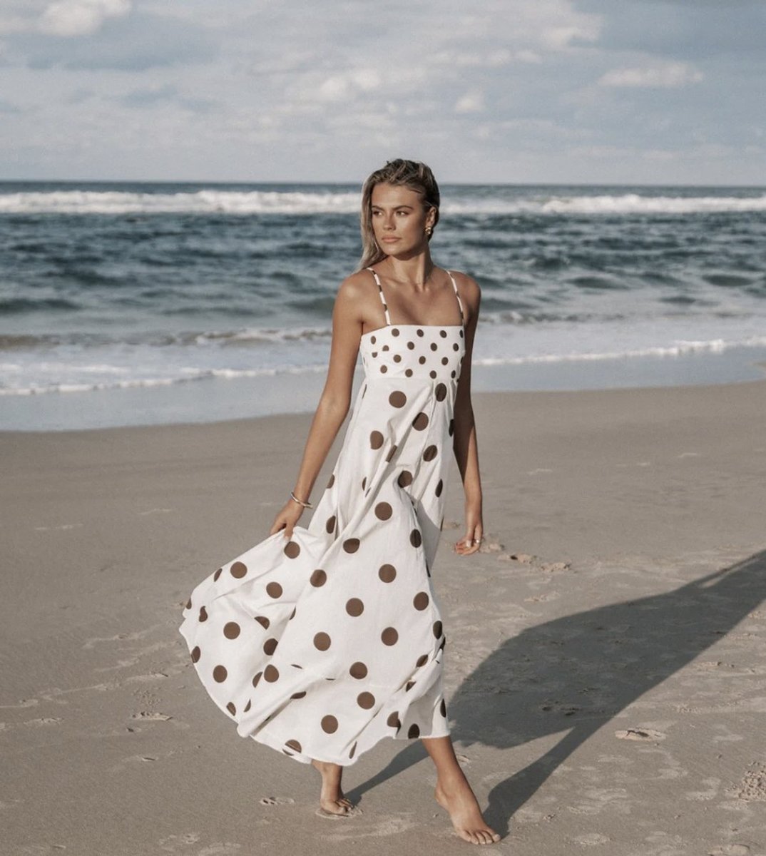 woman wearing deenie maxie dress on beach Petal & Pup