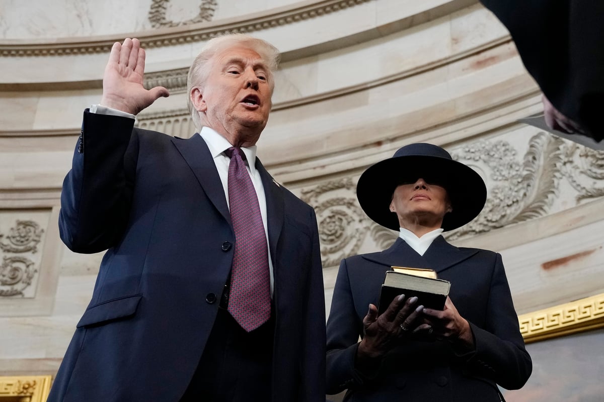 Trump getting sworn in at his inauguration.