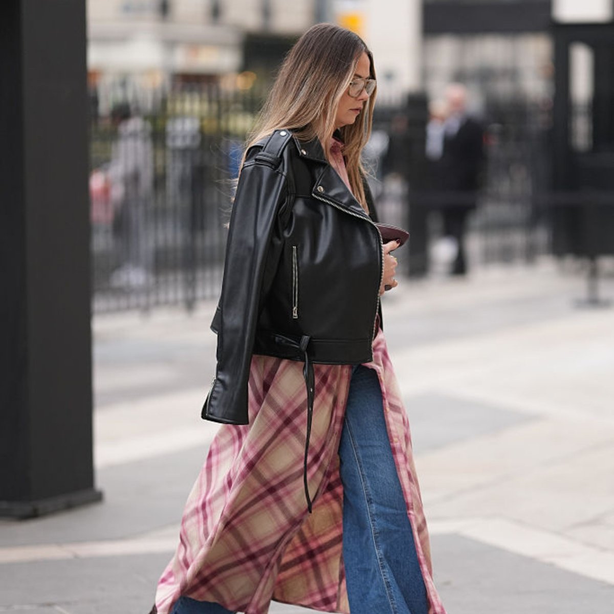 An expert guide to styling dresses over pants. An expert guide to styling dresses over pants.