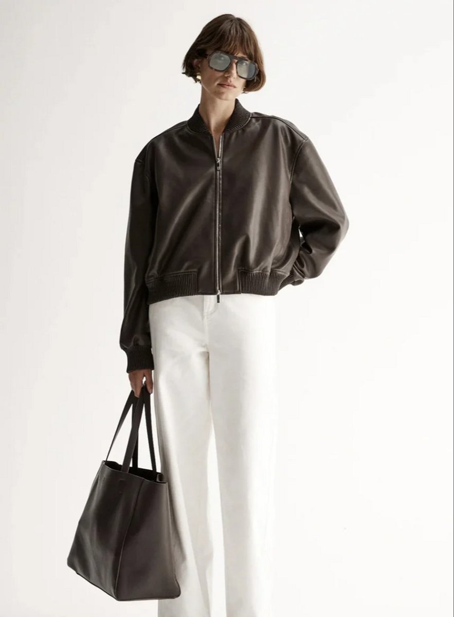 woman wearing brown jacket from Elka Collective 
