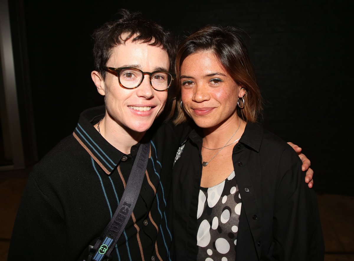 Elliot Page and girlfriend Julia Shiplett pose at the opening night of 