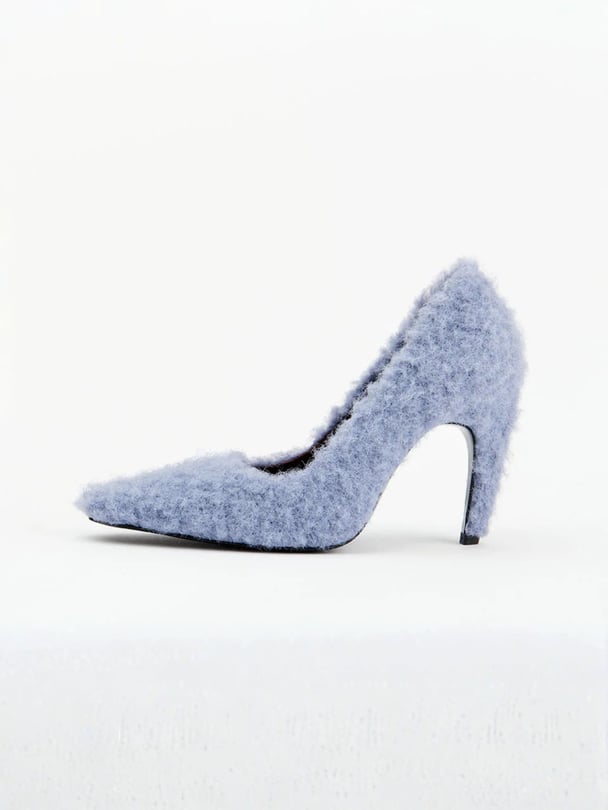 Blue fluffy heels.