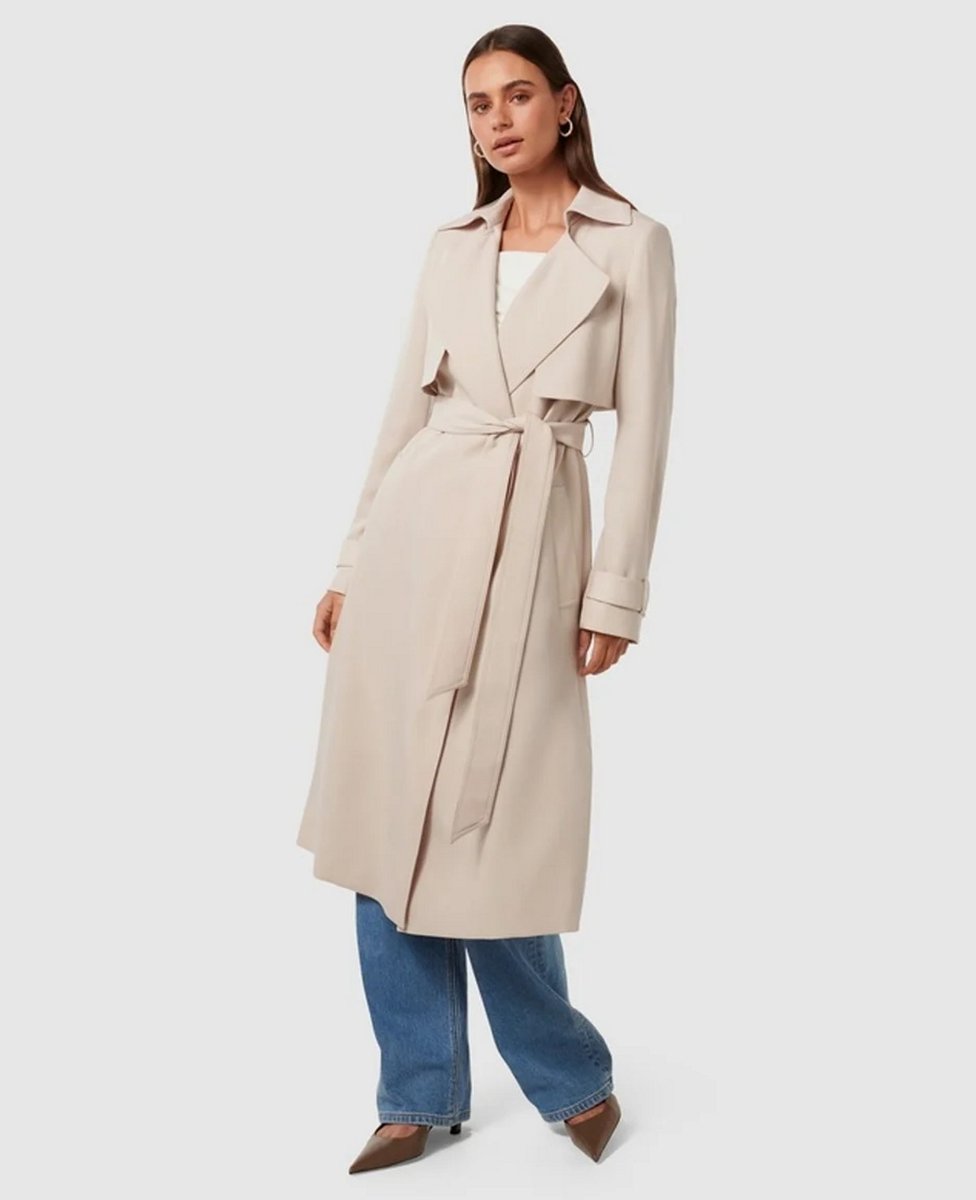 woman wearing sand coloured trench coat 