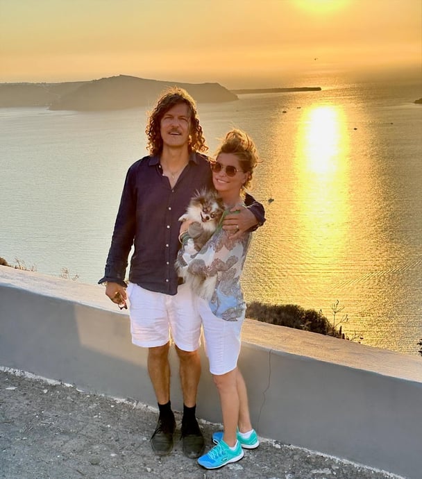 shania-twain-frederic-theibaud-with-dog-sunset-water