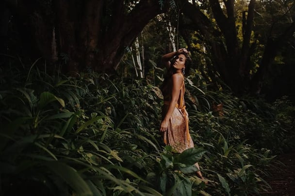 Hannah Kobayashi poses in a forest.