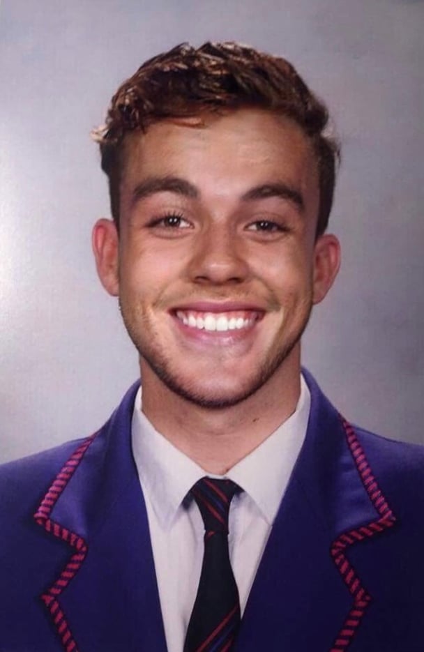 Survivor-activist Harrison James in a school photo.