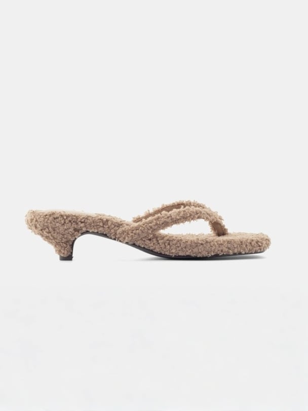 Brown fluffy kitten heels.